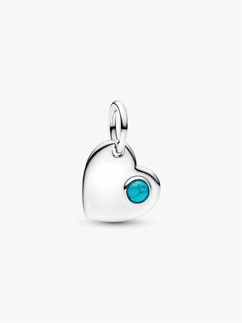 Lady's Pandora heart sterling silver dangle with capri blue crystal