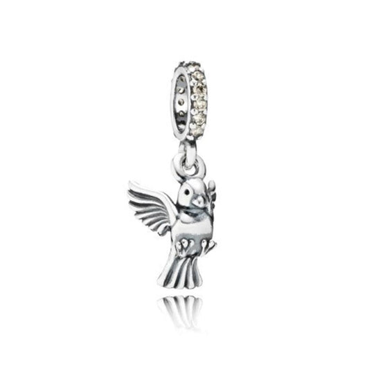 dove of peace, golden colored CZ